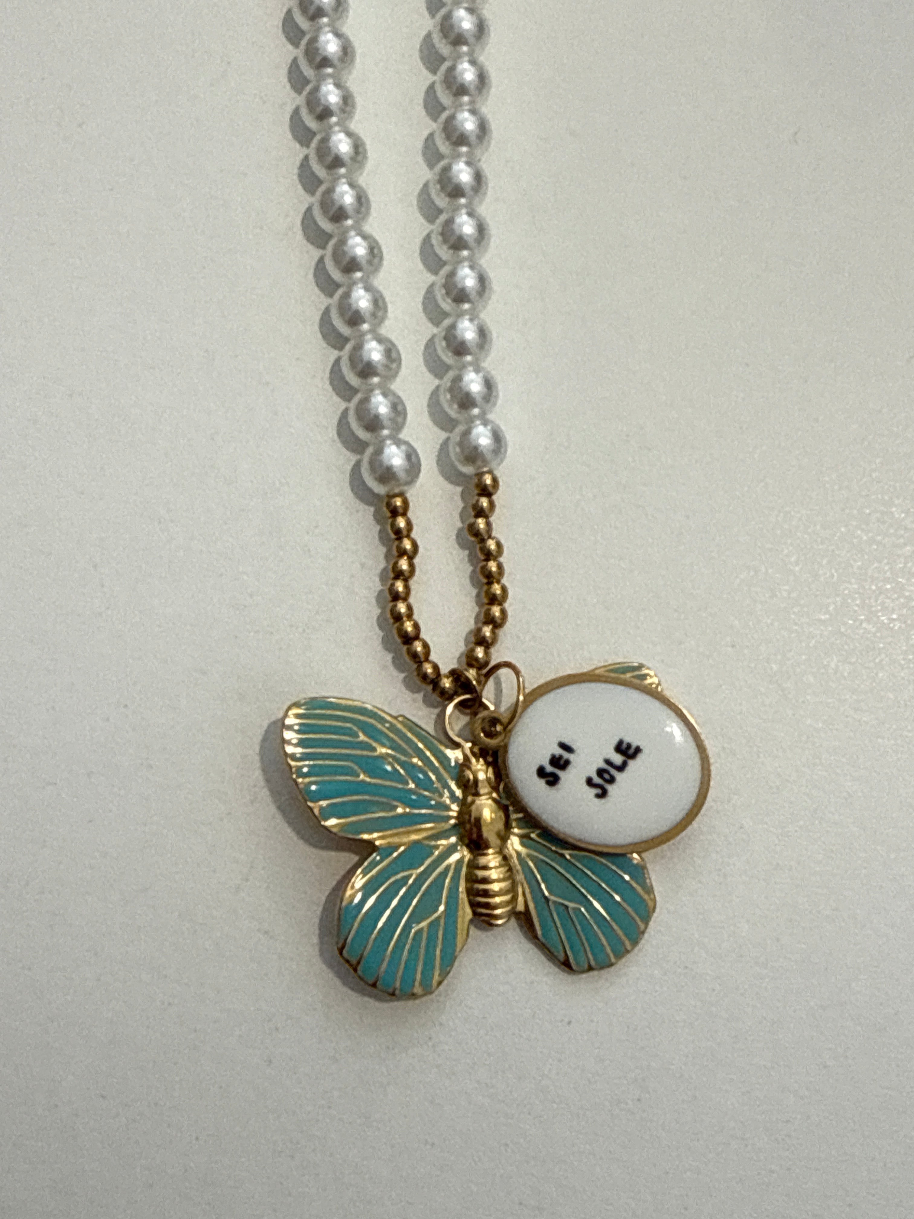 Collana farfalla con scritta “sei il sole”