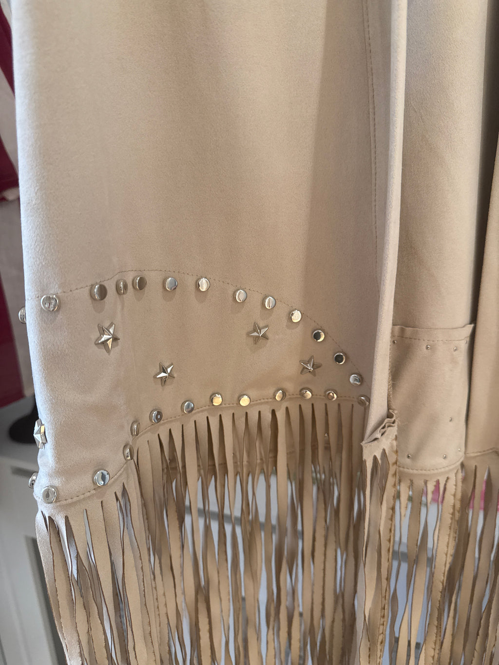Gilet con frange beige