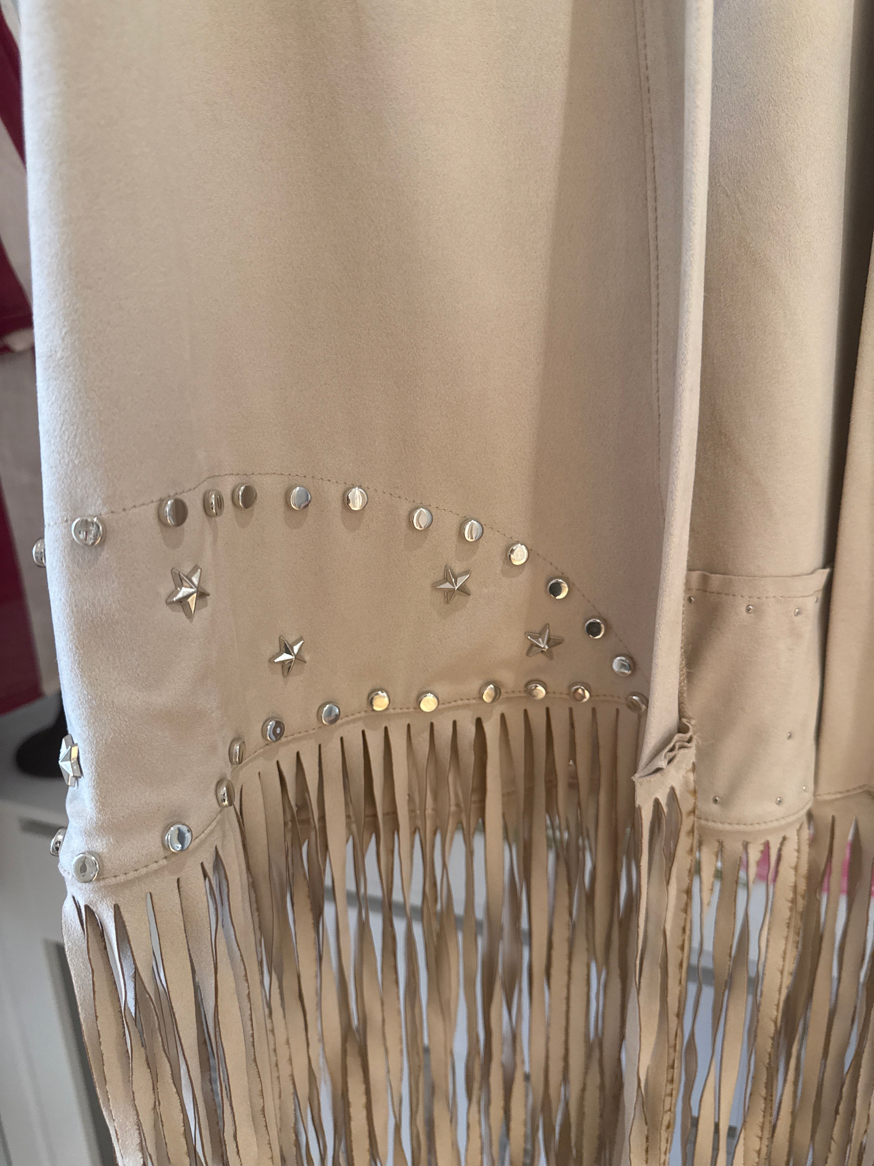 Gilet con frange beige