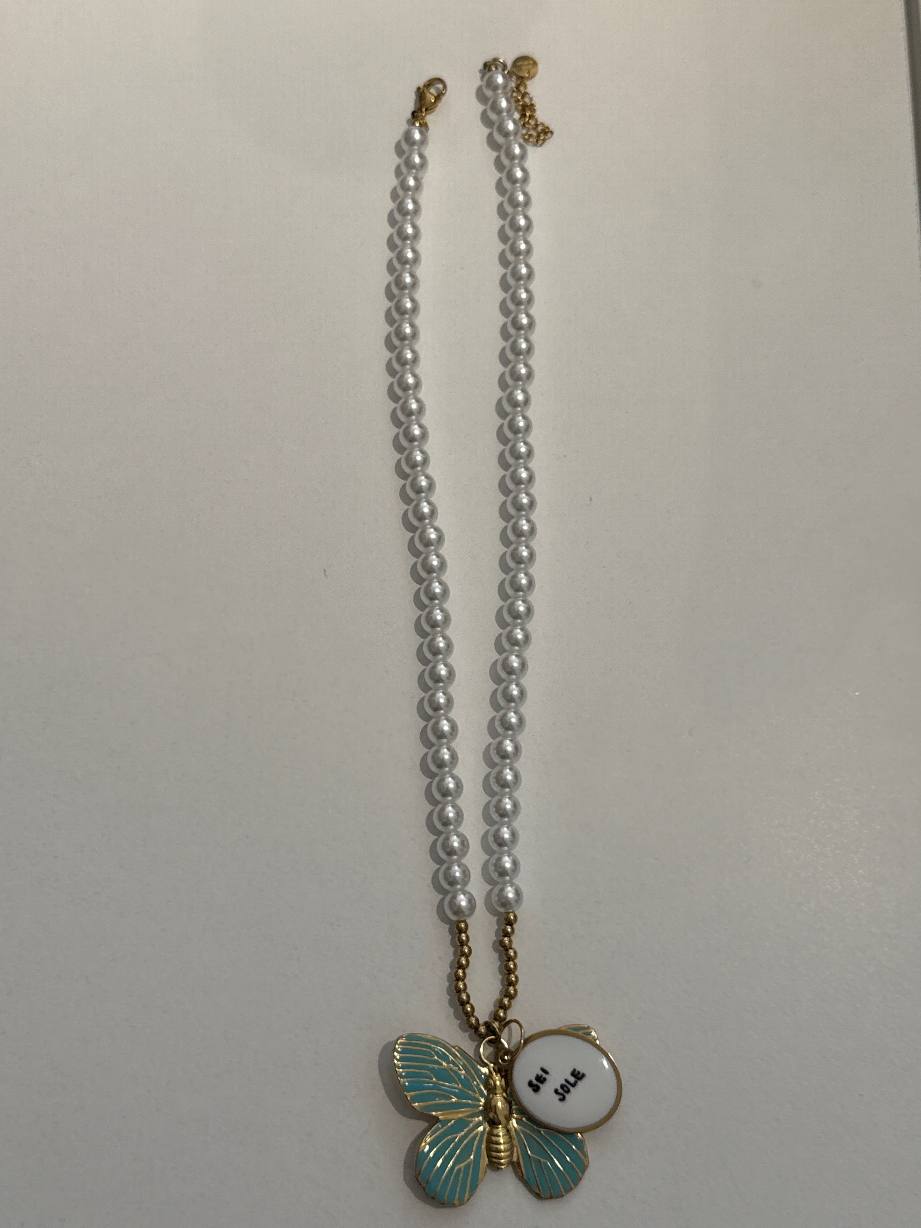 Collana farfalla con scritta “sei il sole”